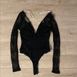 Lulu's Black Asymmetrical Long Sleeve Bodysuit